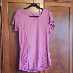 Gaiam ruched yoga top with back cut out.